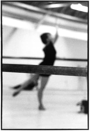 Black and white dancer photograph titled Barre by Angelique Antoniou