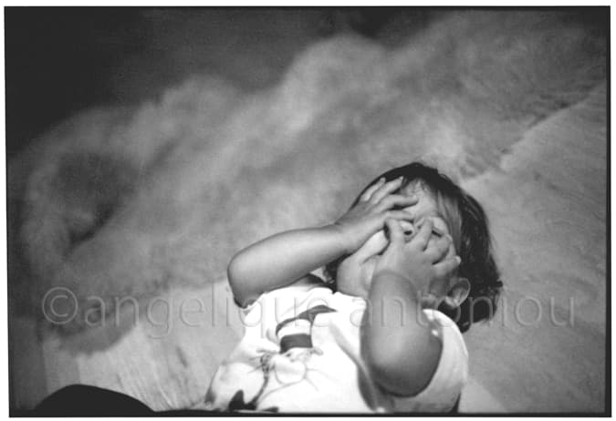 Black and white children photograph titled Sleepies by Angelique Antoniou