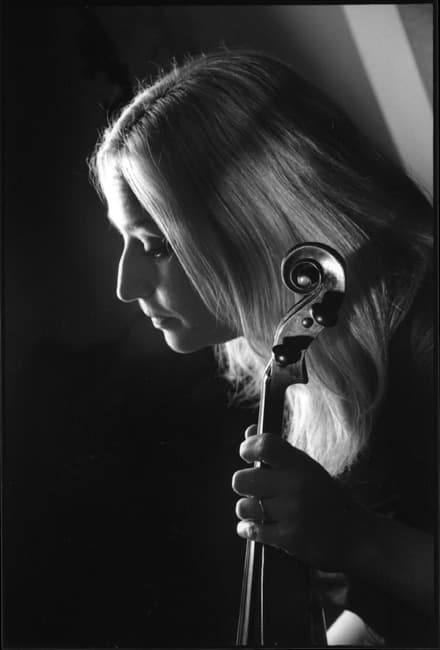 Black and white people photograph titled Solo Violin by Angelique Antoniou