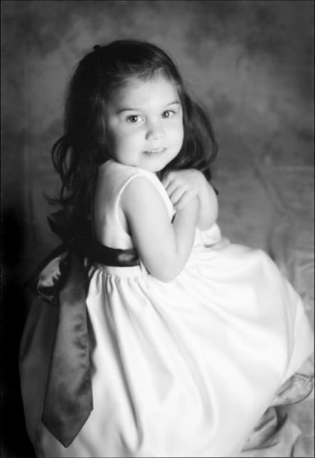 Black and white portrait studio photograph by Angelique Antoniou