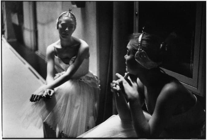 Black and white dancer photograph titled Sitting Swans by Angelique Antoniou